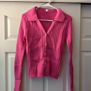 Pink thick sweater/cardigan.